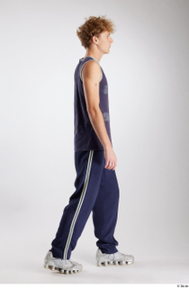 Urien  1 blue tank top blue track pants dressed…